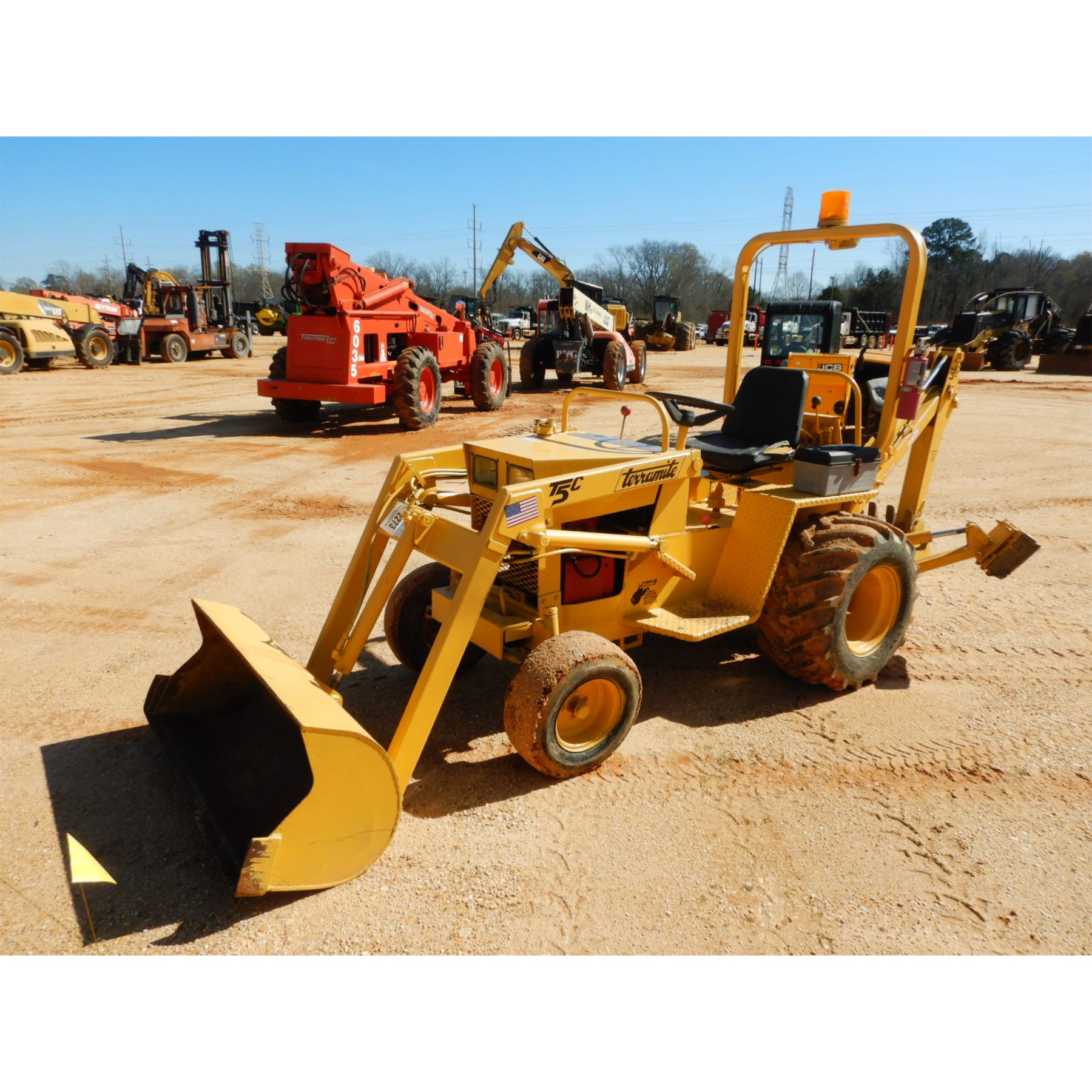TERRAMITE T5C Backhoe J.M. Wood Auction Company, Inc.