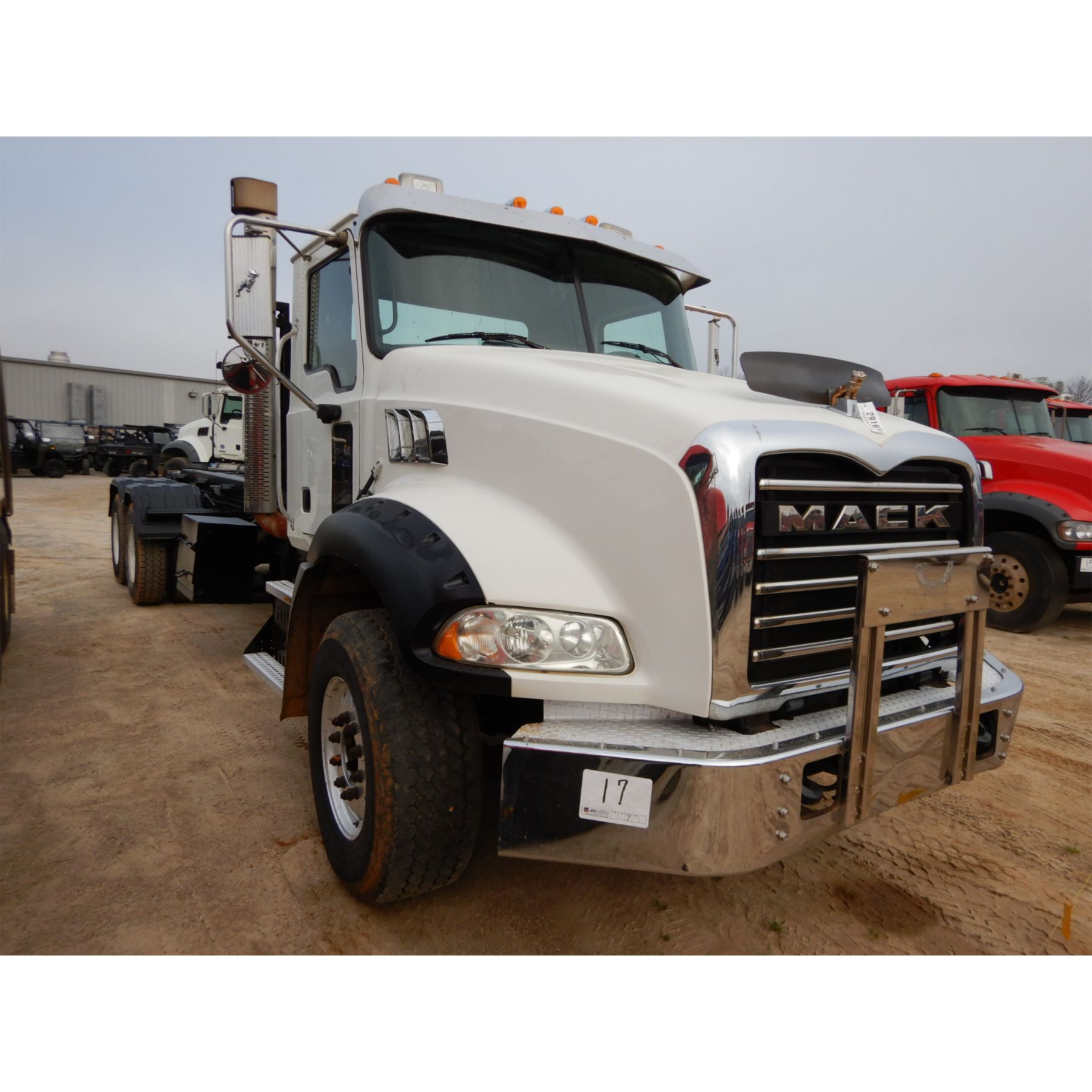 2009 MACK GU813 Roll Off Truck J M Wood Auction Company 2009 MACK GU813 Roll Off Truck J M Wood Auction Company