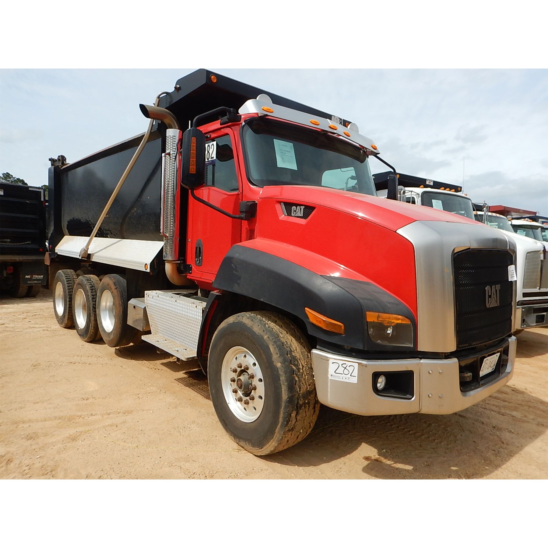 2013 CATERPILLAR CT660 Dump Truck J.M. Wood Auction Company, Inc.
