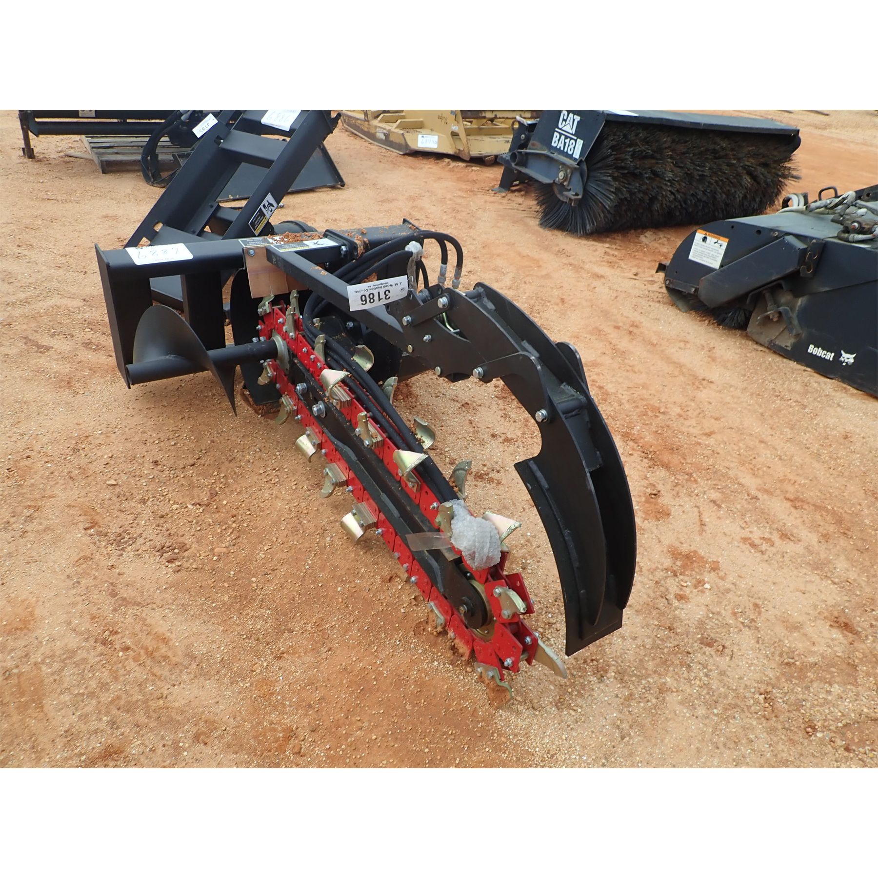 Skid Steer Attachment J.M. Wood Auction Company, Inc.