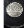 Image 2 : A 1962 Canadian Silver Dollar Incased In Plastic and used as a paperweight
