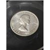 Image 3 : A 1962 Canadian Silver Dollar Incased In Plastic and used as a paperweight