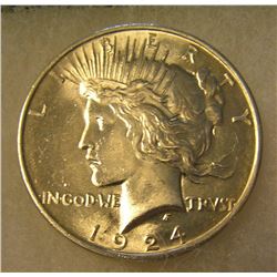 1924 Peace silver dollar in AU condition