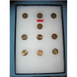 Collection of solid brass US state commemoratives