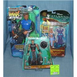 Group of 3 packaged action figures