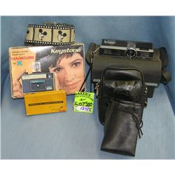 Group of cameras, cases and collectibles