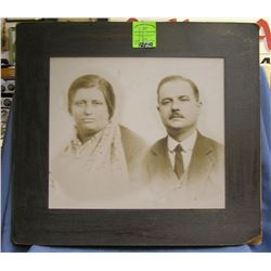 Oversized American immigrant couple photo