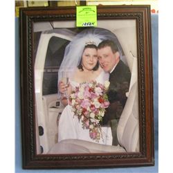 Modern wedding photo in mahogany frame