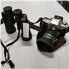 Image 1 : BUSHNELL 10 x 50 BINOCULARS AND CANON EOS ELAN 2 W/ LENS