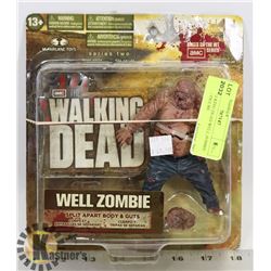 THE WALKING DEAD WELL ZOMBIE ACTION FIGURE.