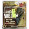 Image 1 : THE WALKING BICYCLE GIRL ZOMBIE ACTION FIGURE.