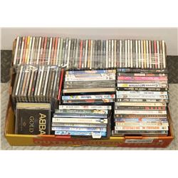 LOT OF ASSORTED CDS AND DVDS