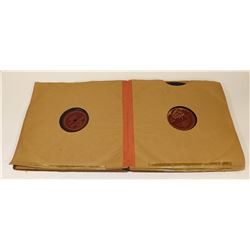 ALBUM OF 12 - 12 INCH PHONOGRAPH RECORDS