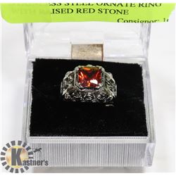 STAINLESS STEEL ORNATE RING WITH RAISED RED STONE