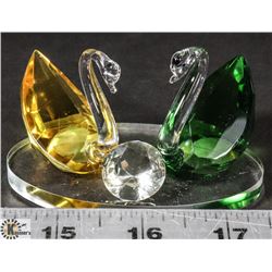 COLORED GREEN AND AMBER CRYSTAL SWANS