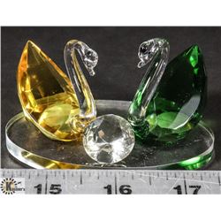 COLORED GREEN AND AMBER CRYSTAL SWANS