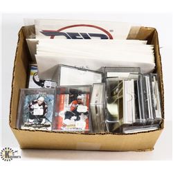 BOX OF ASSORTED COLLECTORS SPORTS CARDS.