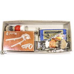 BOX OF VINTAGE BARBERS TOOLS.