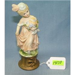 Hand painted porcelain flower girl figurine