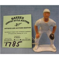 Miniature hard plastic baseball player