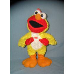 Figural and animated chicken dancing Elmo