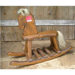 Wood, leather & mohair rocking horse with glass eyes