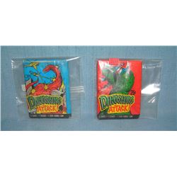 Pair of dinosaurs attacks unopened wax card packs