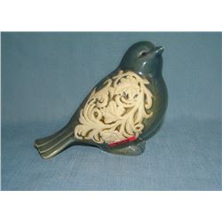 Porcelain painted bird 3 inches high by 6 inches long