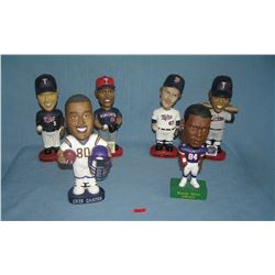 Minnesota Twins and Vikings bobble head figures