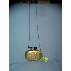 Gold toned designer signed hand bag