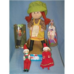 Box full of collectible dolls