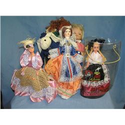 Box full of collectible dolls and more