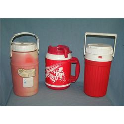 Group of 3 beverage cooler bottles
