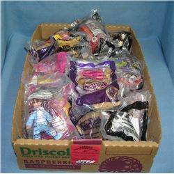 Box full of vintage fast food collectible toys