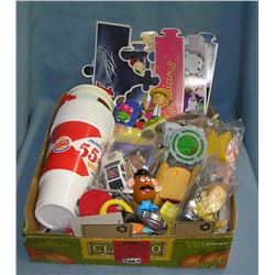 Box full of vintage fast food collectible toys