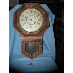 Antique wall clock by Wm L Gilbert Clock Co