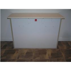 Portable bar with rear storage area