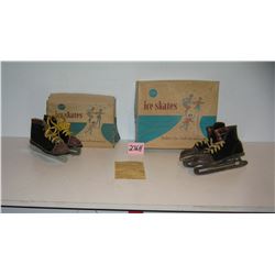 2 pairs of early leather and metal ice skates