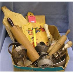 Box full of antique kitchen wares