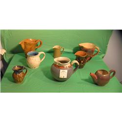 Collection of art pottery pitchers