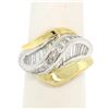 Image 1 : 18k Yellow Gold & Platinum Wavy 2.50 ctw F VS1 Baguette & Princess Diamond Ring