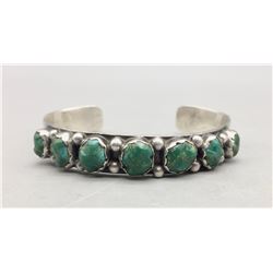 Seven Stone Carved Turquoise Bracelet