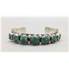 Image 1 : Seven Stone Carved Turquoise Bracelet