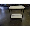 Image 2 : ANTIQUE METAL ENAMELED 2 TIER ROLLING TABLE