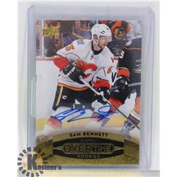 SIGNED SAM BENNETT CALGARY FLAMES OVERTIME CARD,