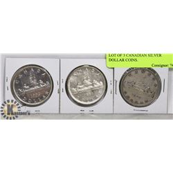 LOT OF 3 CANADIAN SILVER DOLLAR COINS.