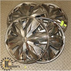 LOT OF 4 HUB CAPS.