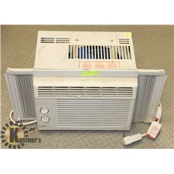 WINDOW AIR CONDITIONING UNIT.