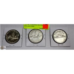 LOT OF 3 CANADIAN SILVER DOLLAR COINS.