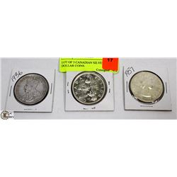 LOT OF 3 CANADIAN SILVER DOLLAR COINS.
